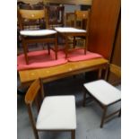 A G-Plan or style mid-century lightwood extending dining table & four matching chairs Condition