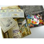 Two vintage tins containing late twentieth century pin badges & the other with cigarette cards
