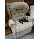 A modern Celebrity electric recliner armchair with floral upholstery Condition reports are