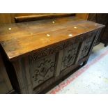 A carved antique coffer blanket chest with later top Condition reports are provided on request by