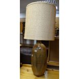 A mid to late twentieth century oversized sgraffito pottery table lamp with shade Condition