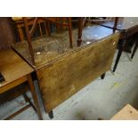 An antique drop leaf dining table Condition reports are provided on request by email only for this