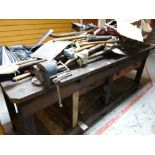 A characterful vintage workbench with mounted vice, lower tier & drawer Condition reports are
