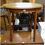 An oval mahogany occasional table Condition reports are provided on request by email only for this