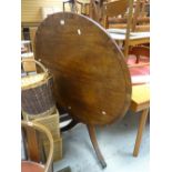 A reproduction tilt-top circular breakfast table on spider support Condition reports are provided on