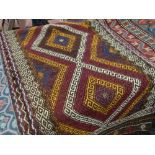A Suzni Kelim runner rug, 267 x 74cms Condition reports are provided on request by email only for