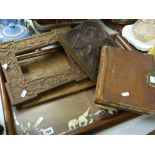 An early twentieth century lockable book ledger, an Indian decorative tray & two carved wood items