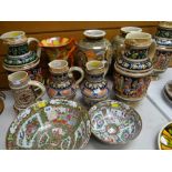 A collection of ornamental pottery steins, pair of Oriental-type baluster vases, pair of Famille