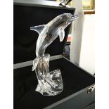 A boxed Swarovski Silver Crystal dolphin ornament