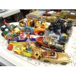A parcel of TV themed toys including Wacky Races sports car, Chitty Chitty Bang Bang, Magic
