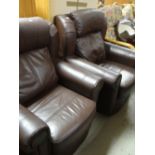 A pair of modern chocolate brown leather armchairs Condition reports are provided on request by