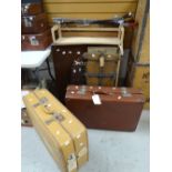 Two good vintage suitcases complete with travel labels, a vintage clothes press, open bookcase & a