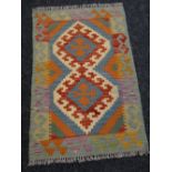 A vegetable dye wool Choli Kelim runner, 89 x 60cms Condition reports are provided on request by