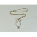 9ct yellow gold bow design pendant with seven stone diamond drop on 9ct yellow gold flat curb link