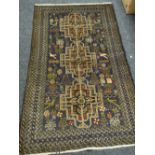 An Old Baluchi rug, 188 x 113cms Condition reports are provided on request by email only for this