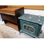 A painted metal French-style log burner Condition reports are provided on request by email only