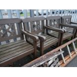 A set of six wooden outside garden chairs