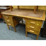 A good vintage desk with leather surface & bank of six drawers Condition reports are provided on