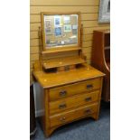 A vintage three-drawer dressing table with swivel mirror & jewellery drawer Condition reports are