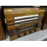 A Regentone vintage veneer cased radio Condition reports are provided on request by email only for