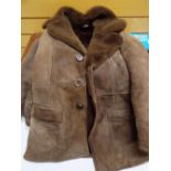 A twentieth century suede & fur overcoat Condition reports are provided on request by email only for
