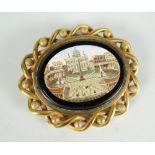 A micro-mosaic Vatican City brooch in outer yellow metal twist frame Condition reports are