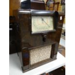 A Cossor Art Deco period veneer encased radio Condition reports are provided on request by email