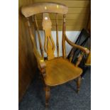 A good antique farmhouse Windsor elbow chair on turned supports Condition reports are provided on