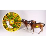 Two Beswick standing horses & a Poole flambe-style yellow ground plate Condition reports are