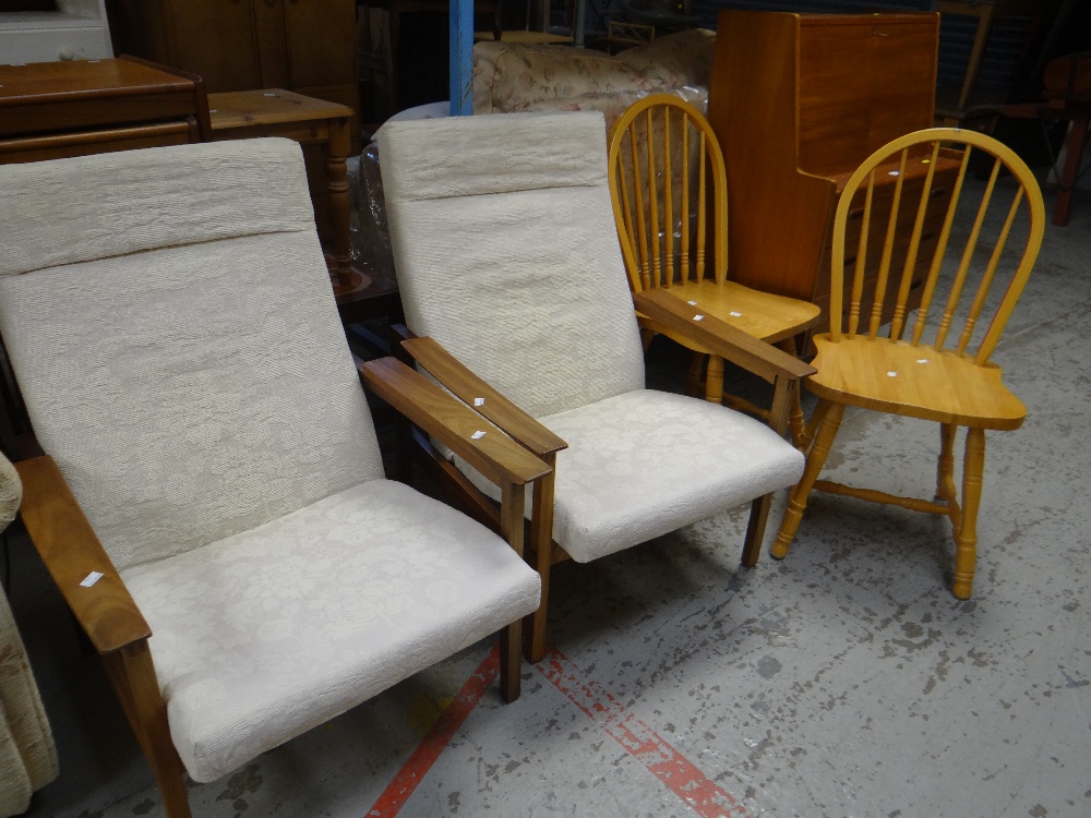 A pair of lightwood cushioned armchairs & a pair of hoop back pine kitchen chairs Condition