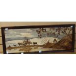 A framed marquetry panel of an Indian landscape with ox driven cart & distant temple, 37 x 93cms