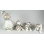 A Nao figure of a girl with lamb & three Lladro puppies Condition reports are provided on request by