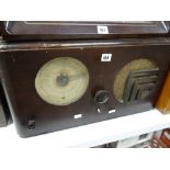 An Art Deco period vintage radio Condition reports are provided on request by email only for this