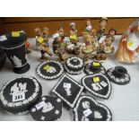 A parcel of Wedgwood black Jasperware table items & a quantity of Hummel figures Condition reports
