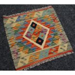 A vegetable dye wool Choli Kelim runner, 47 x 51cms Condition reports are provided on request by