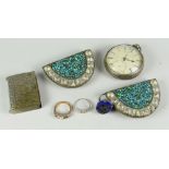 A vintage silver encased pocket watch, a pair of mosaic belt buckles, three various rings ETC