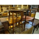 A circular inlaid mahogany table, similar tub chair with upholstered seat Condition reports are