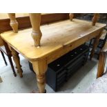 A farmhouse pine table & a stained four-drawer plan chest Condition reports are provided on
