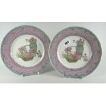 A pair of Chinese eggshell plates with pink & bird's egg blue ground borders, 21.5cms diam Condition