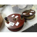 A believed Bakelite fishing reel & an antique wooden & brass mounted fishing reel Condition