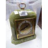 An onyx table clock & a suitcase of collectables Condition reports are provided on request by