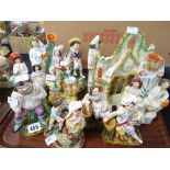 A parcel of mainly Staffordshire figures and pair of porcelain figures of gilded musicians Condition