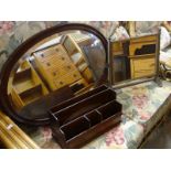 A vintage oval wall mirror, an antique toilet mirror & a letter rack Condition reports are