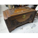 A vintage carved & stepped Oriental camphor wood chest Condition reports are provided on request