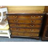 A good nineteenth century mahogany secretaire chest having false drawers dropping down to reveal