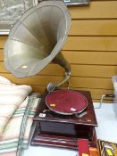 A wind-up gramophone player with horn Condition reports provided on request by email for this