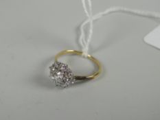 An 18ct yellow gold diamond floral cluster ring Condition reports provided on request by email for