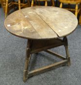 A good nineteenth century oak cricket table with shelved base Condition reports provided on