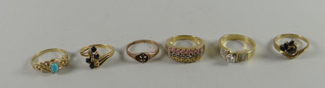 Six assorted gold / yellow metal dress rings Condition reports provided on request by email for this