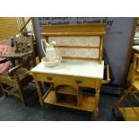 A vintage lightwood & veined marble tile back wash stand with single drawer & bottom recess, bearing